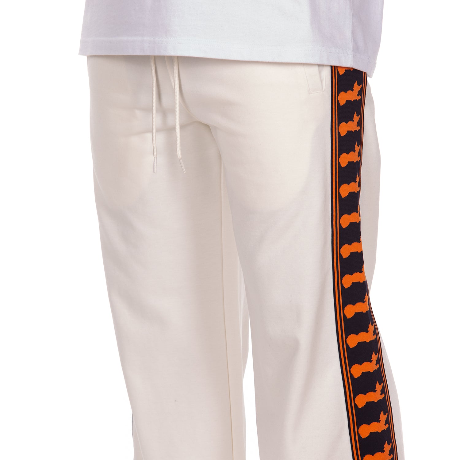 White pants with orange and navy striped sides on a white background