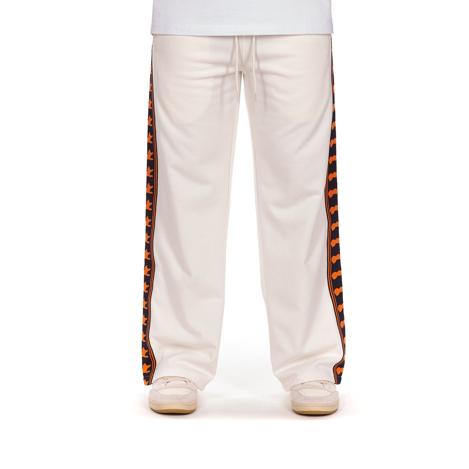White pants with orange and black striped sides on a white background